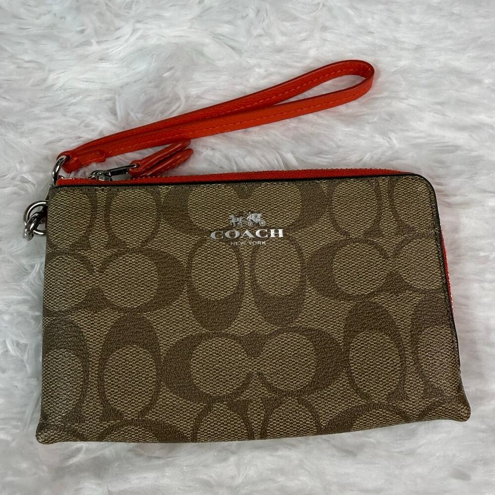COACH Brown Signature Coated Canvas Wristlet